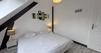 Gîte de la Châtaigneraie à Saint Yrieix La Perche en Haute-Vienne (Nouvelle Aquitaine) - chambre 1 - version lits rapprochés_27