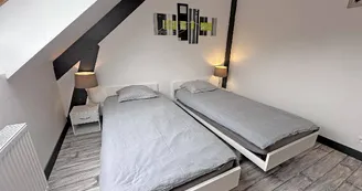 Gîte de la Châtaigneraie à Saint Yrieix La Perche en Haute-Vienne (Nouvelle Aquitaine) - chambre 1 - version lits simples_32